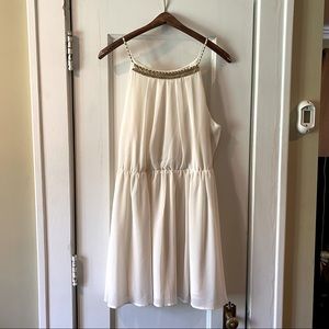 Cream white sleeveless dress with keyhole back